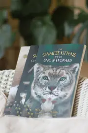 The Siamese Kittens and the Snow Leopard